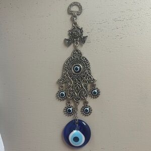 Ornate Silver Hamsa Wall Decor with Blue Accent